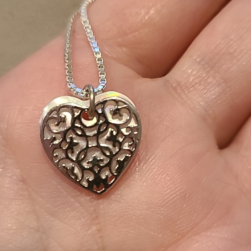 Filigree heart over mother of pearl heart sterling silver necklace